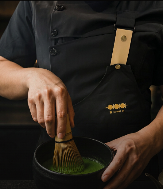 Ceremonial matcha whisked in a black chawan